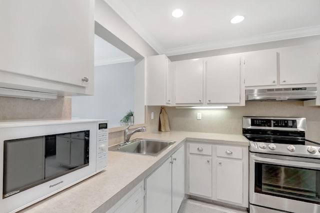 kitchen featuring white microwave, under cabinet range hood, light countertops, stainless steel electric range, and a sink