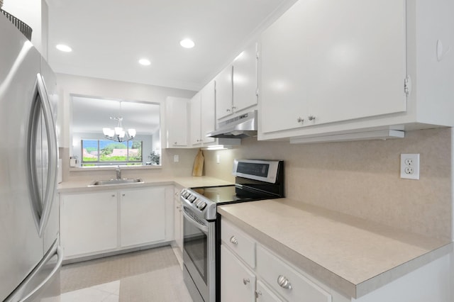 kitchen featuring a sink, decorative backsplash, light countertops, stainless steel appliances, and under cabinet range hood