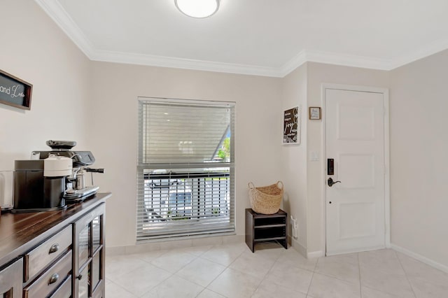 foyer entrance featuring light tile patterned floors, baseboards, and ornamental molding