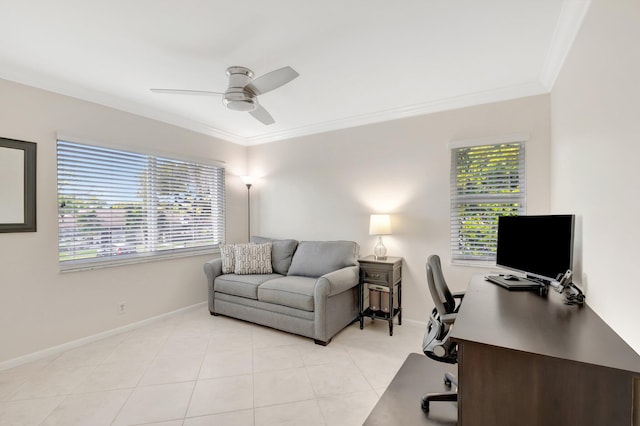 office space featuring light tile patterned floors, plenty of natural light, ceiling fan, and crown molding