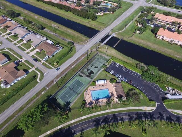 bird's eye view with a water view