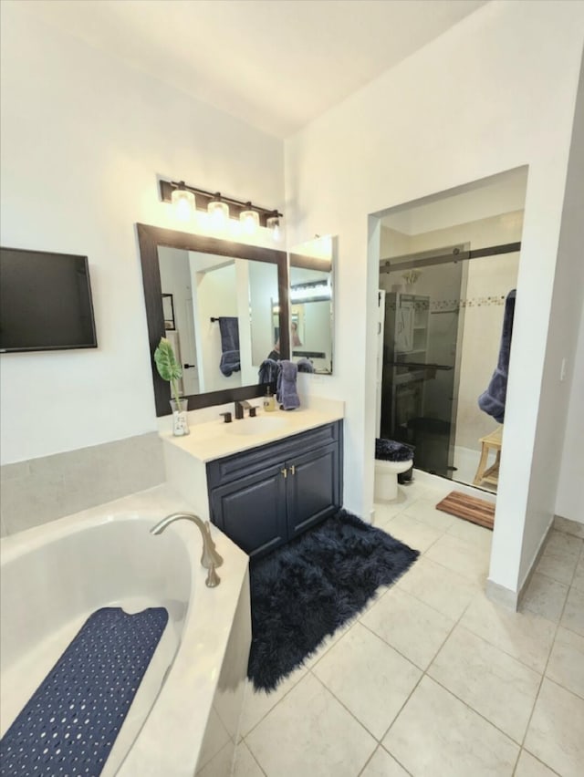 123 E Prive Cir, Delray Beach, FL 33445 - full bathroom featuring a bath, a shower stall, vanity, and tile patterned flooring