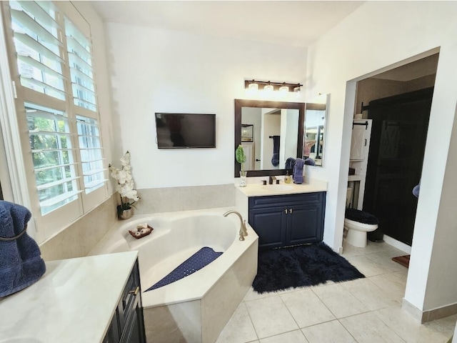 123 E Prive Cir, Delray Beach, FL 33445 - bathroom with vanity, a garden tub, healthy amount of natural light, and toilet