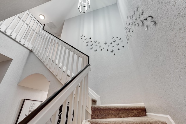 123 E Prive Cir, Delray Beach, FL 33445 - staircase featuring a textured wall