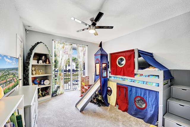 123 E Prive Cir, Delray Beach, FL 33445 - bedroom featuring access to outside, carpet floors, a textured ceiling, and a ceiling fan