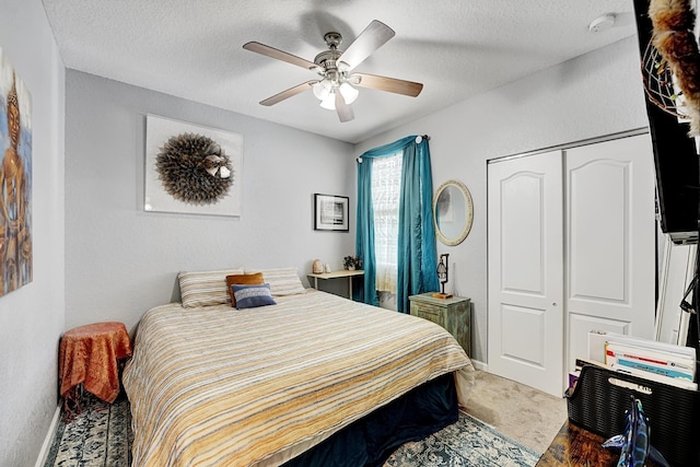 123 E Prive Cir, Delray Beach, FL 33445 - bedroom with a textured ceiling, a closet, ceiling fan, and baseboards