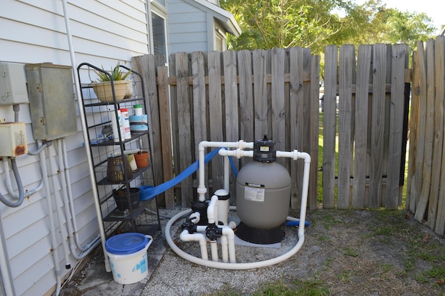 exterior details with pump and fence