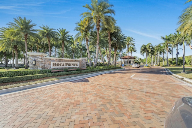 exterior space with curbs and street lights