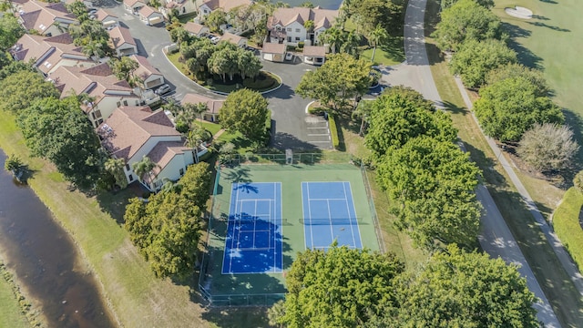 birds eye view of property with a residential view