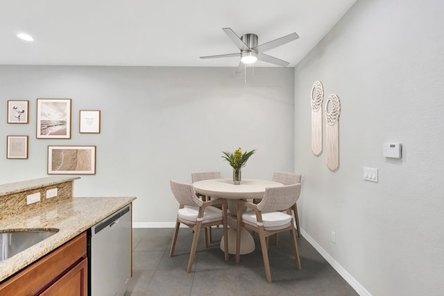 dining space with light tile patterned floors, recessed lighting, a ceiling fan, and baseboards