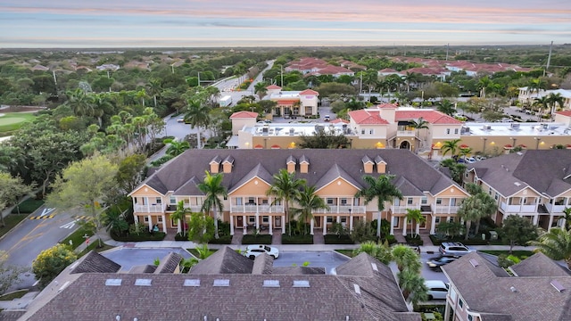 bird's eye view with a residential view and a water view