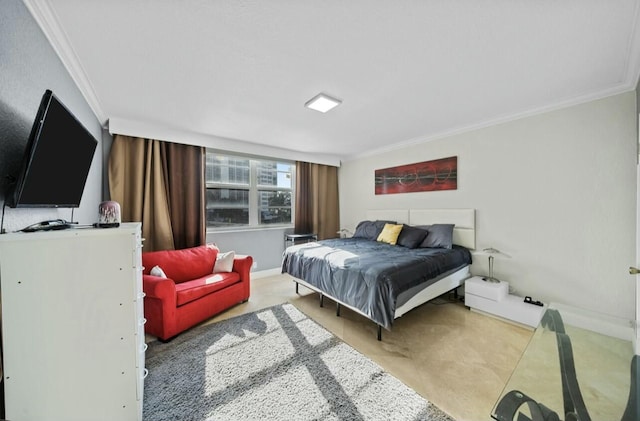 bedroom featuring baseboards, carpet, and crown molding