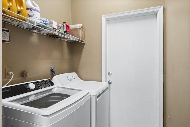 laundry room with laundry area and washer and dryer