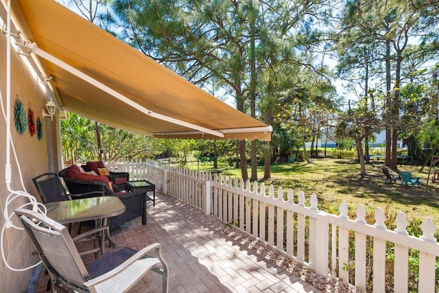 view of patio with fence