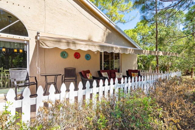 view of home's exterior with stucco siding