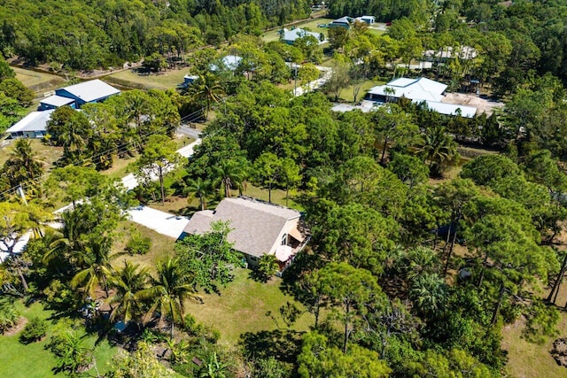 aerial view featuring a forest view