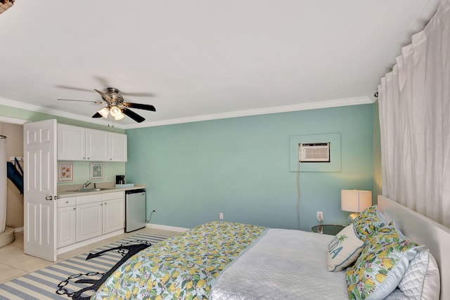 bedroom with a sink, baseboards, crown molding, and a wall mounted AC