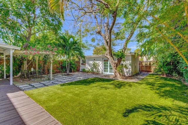 view of yard with a patio area and fence