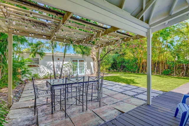 535 28th St, West Palm Beach, FL 33407 - view of patio / terrace with a pergola and outdoor dining area