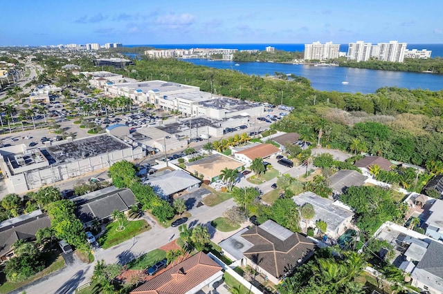 drone / aerial view with a view of city and a water view