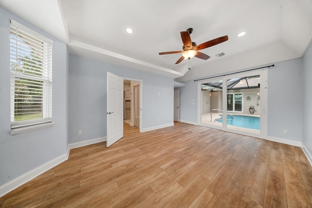 unfurnished living room with light wood finished floors, recessed lighting, a ceiling fan, and baseboards