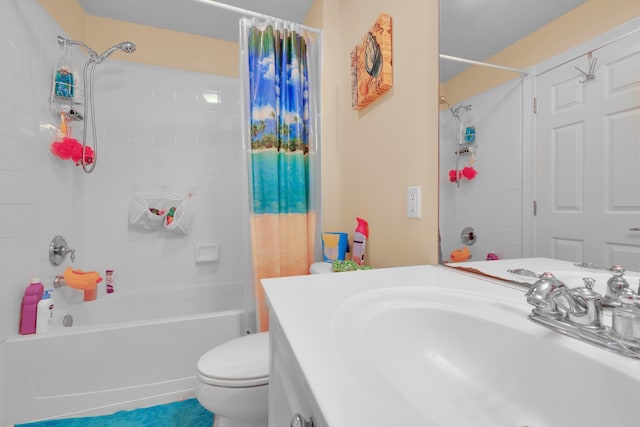 full bathroom featuring shower / bath combo, vanity, and toilet