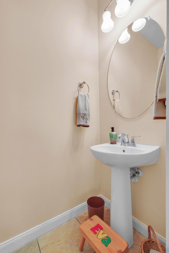 bathroom featuring tile patterned floors and baseboards