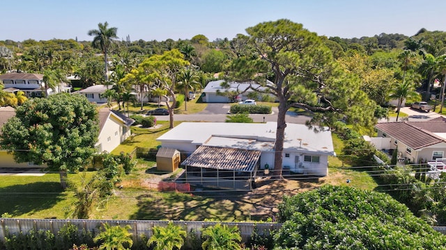 birds eye view of property with a residential view