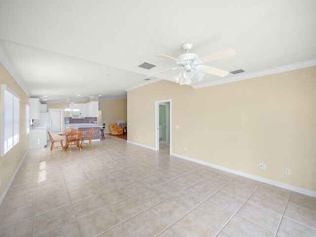 empty room featuring a ceiling fan, a textured ceiling, baseboards, and wood finished floors