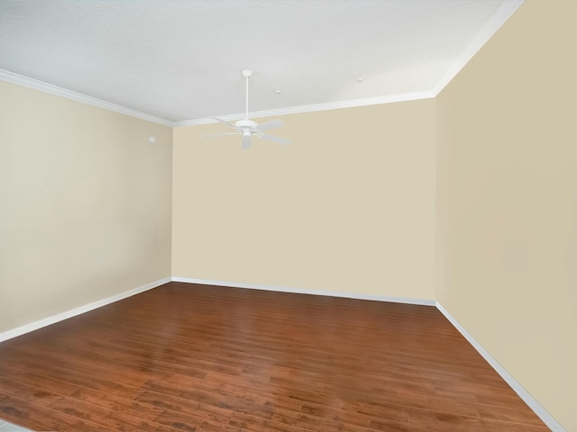 spare room featuring ornamental molding, ceiling fan, baseboards, and wood finished floors