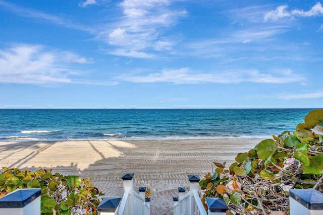 property view of water featuring a beach view