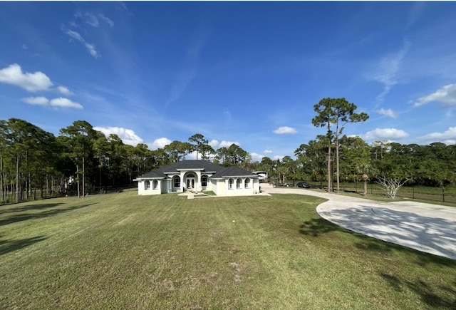 exterior space with a yard and driveway