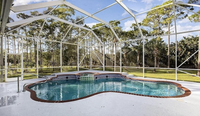 view of pool with glass enclosure, a pool with connected hot tub, and a patio