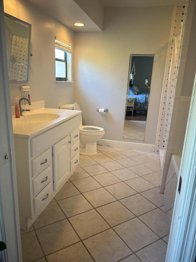 full bathroom featuring tiled bath, toilet, a shower with curtain, tile patterned flooring, and vanity