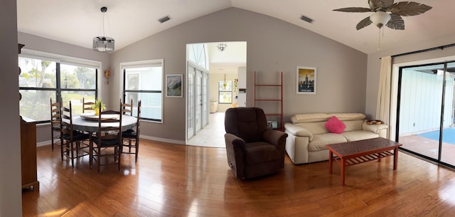 1826 SW Stratford Way, Palm City, FL 34990 - dining space with lofted ceiling, light wood-style flooring, ceiling fan, and baseboards