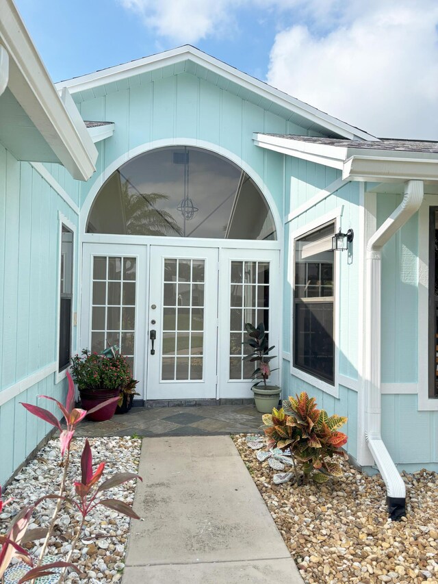 1826 SW Stratford Way, Palm City, FL 34990 - view of exterior entry with french doors