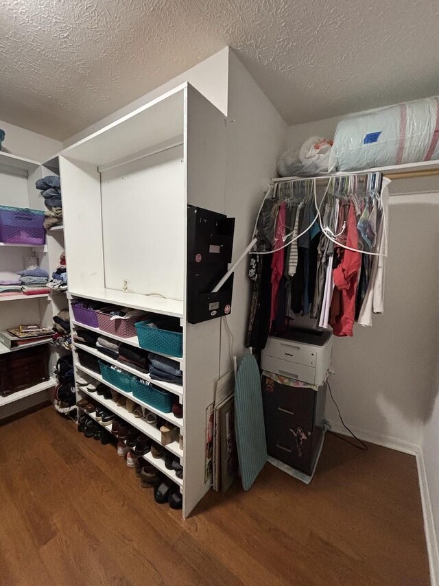1826 SW Stratford Way, Palm City, FL 34990 - walk in closet with wood finished floors