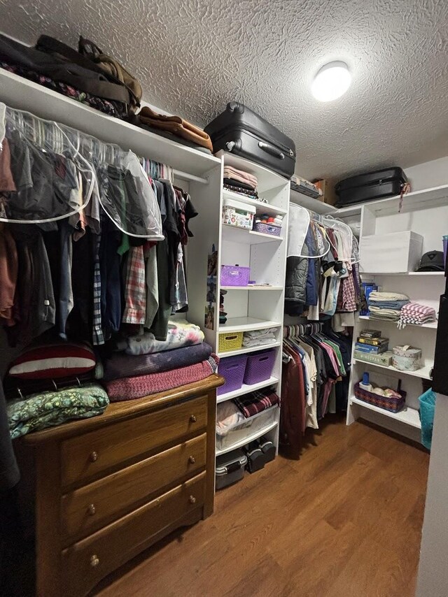 1826 SW Stratford Way, Palm City, FL 34990 - walk in closet with wood finished floors