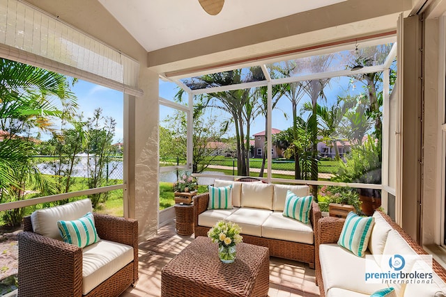 view of patio featuring an outdoor living space and glass enclosure