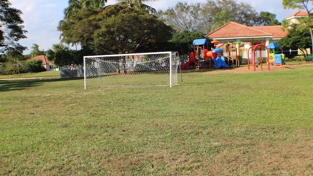 view of yard featuring playground community