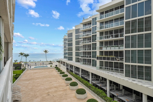 view of property with a water view