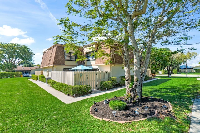 view of yard with fence