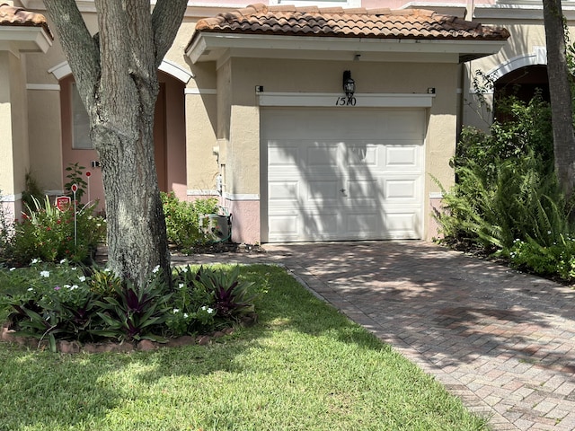 exterior space with decorative driveway