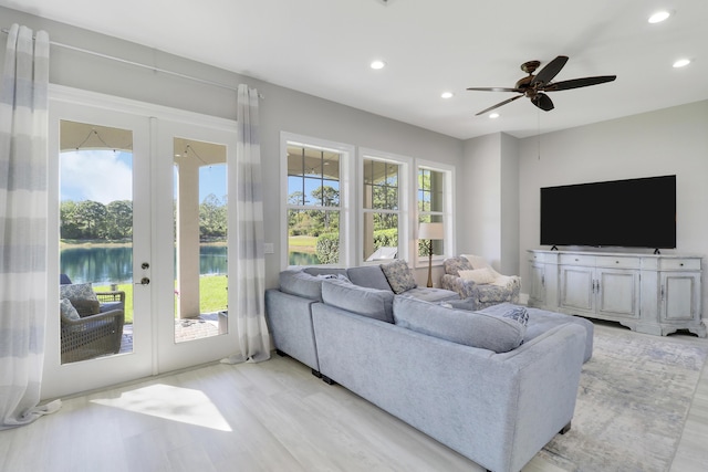 living room featuring recessed lighting, french doors, light wood-style flooring, and a ceiling fan