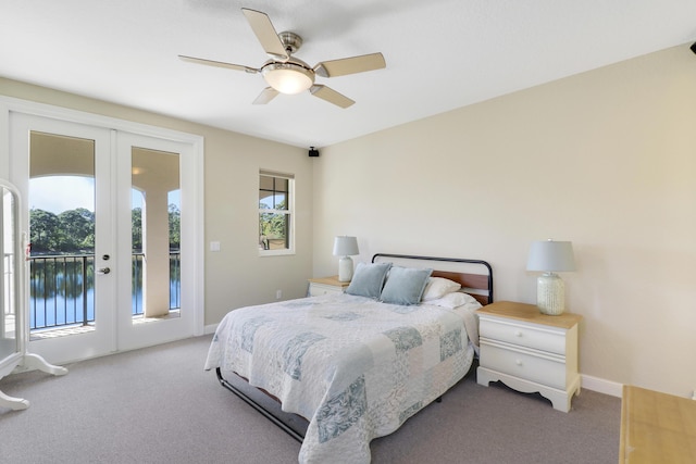 carpeted bedroom with a ceiling fan, access to outside, french doors, and baseboards