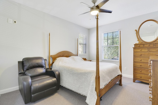 bedroom featuring baseboards, carpet floors, and ceiling fan