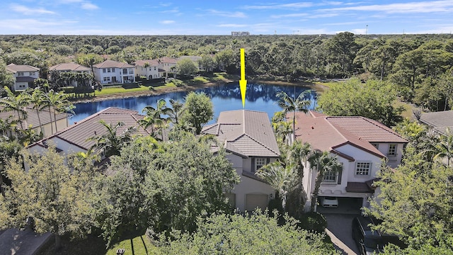 bird's eye view with a residential view and a water view