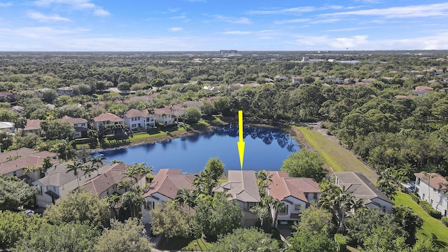 birds eye view of property featuring a residential view and a water view