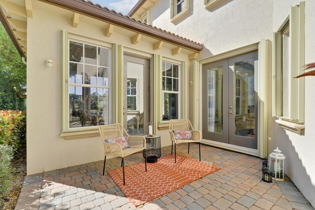 view of patio featuring french doors