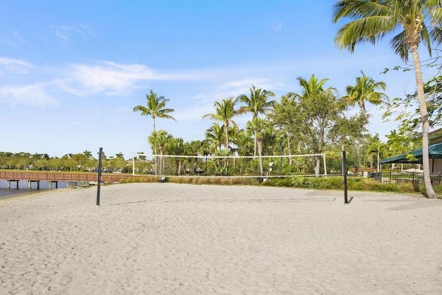 view of home's community featuring volleyball court